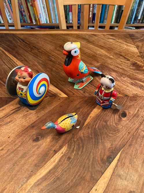 Lot antieke blikken speelgoed met een bli speelgoed papagaai, Antiek en Kunst, Antiek | Speelgoed, Ophalen of Verzenden