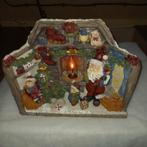 Kerststukje met Kerstman en open haard, Ophalen