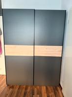 Kledingkast Genua Leen Bakker - Zwart/Eiken, Huis en Inrichting, Kasten | Kledingkasten, Ophalen, Met plank(en), 100 tot 150 cm