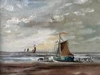 Henk Poeder, platbodem op het strand, Ophalen