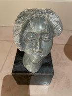 Marmeren Beeld van een Hoofd, Ophalen