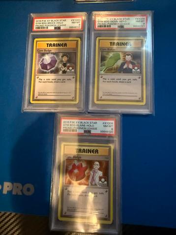 Pokémon Gym Badge Trainer Kaarten PSA 8 beschikbaar voor biedingen