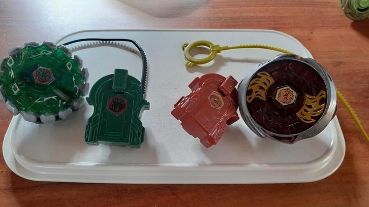 Beyblade electro burn fireblaze en poison serpent zie omschr, Kinderen en Baby's, Speelgoed | Actiefiguren, Gebruikt, Ophalen of Verzenden