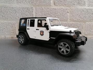 Jeep Wrangler police / speelgoed politieauto van Bruder beschikbaar voor biedingen