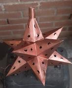 Metalen kerstster, Ophalen