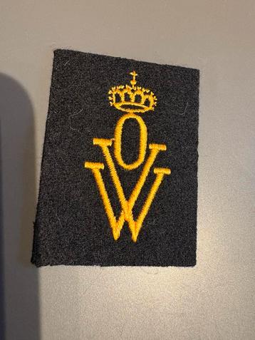 Belgisch militair mouwembleem “OVW” Oorlogsvrijwilliger beschikbaar voor biedingen