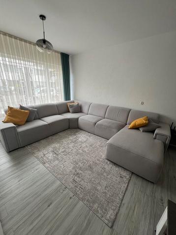 Grijs hoekbank met lounge