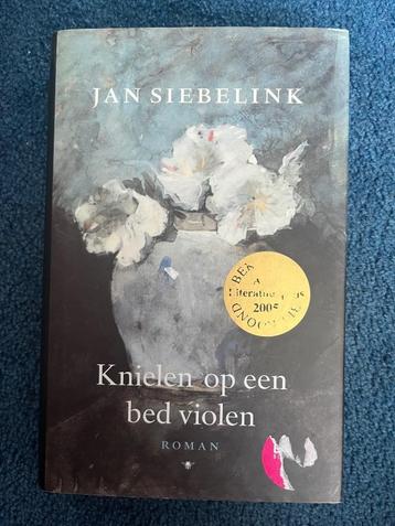 Knielen op een bed violen - Jan Siebelink beschikbaar voor biedingen
