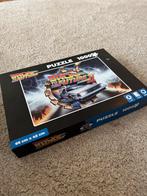Puzzel Back to the Future 66x45cm., Ophalen of Verzenden, 500 t/m 1500 stukjes, Zo goed als nieuw, Legpuzzel