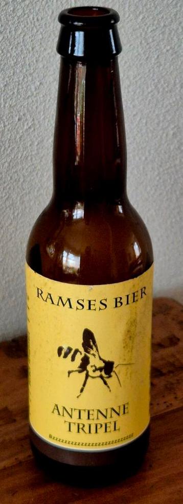 Mooi leeg flesje RAMSES bier ANTENNE TRIPEL met Brabants wat beschikbaar voor biedingen