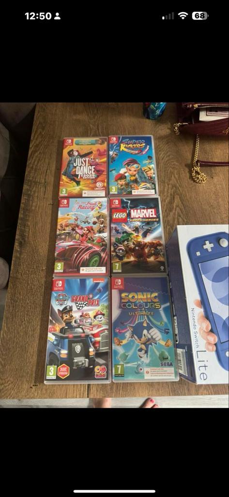 Nintendo Switch Lite + Spellen & Accessoires, Spelcomputers en Games, Games | Nintendo Switch, Zo goed als nieuw, Overige genres