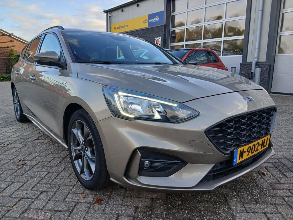 Ford Focus Wagon 1.0 EcoBoost ST Line Business - Navigatie -, Auto's, Gebruikt, Euro 6, 1283 kg, Lichtsensor