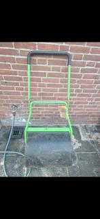 Te huur: tuinwals voor egaliseren en aanrollen van graszoden, Ophalen