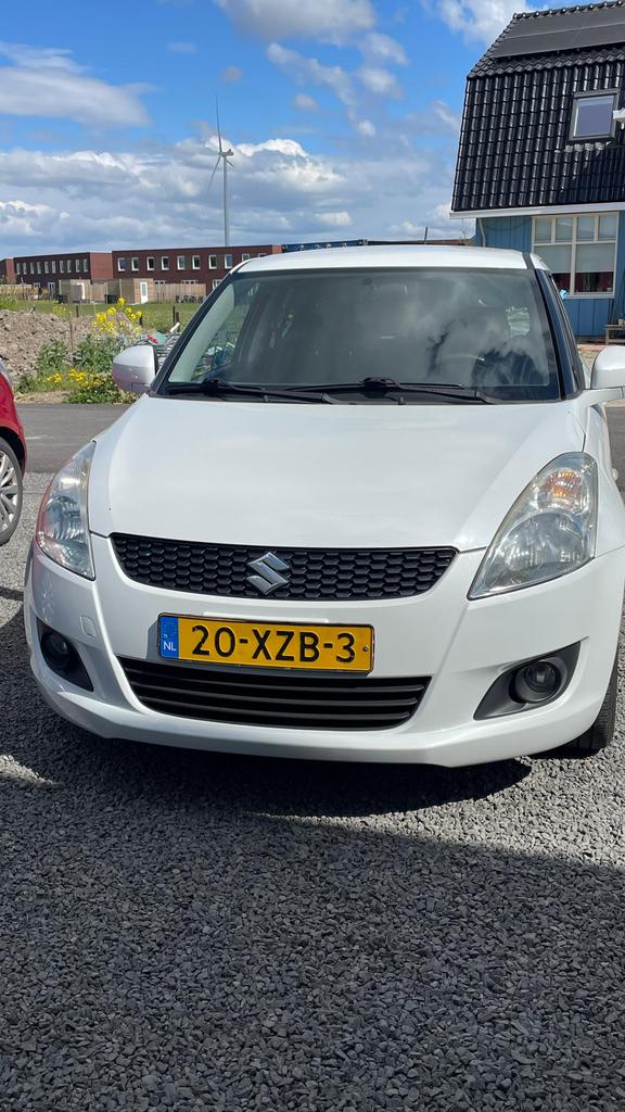 Suzuki Swift 1.2 5-D 2012 Wit/Exclusive/Keyless/Climate/NAVI, Auto's, Voorwielaandrijving, Stof, 4 cilinders, 400 kg