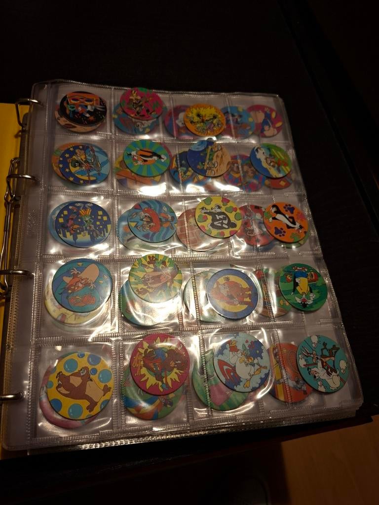 Dikke map met vintage flippo's, Verzamelen, Flippo's, Ophalen of Verzenden