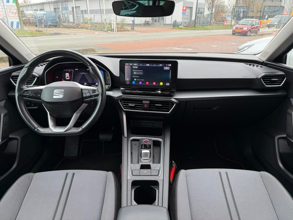 Seat Leon Sportstourer 1.0 eTSI Style Business Intense AUTOM, Auto's, Seat, 12 maanden, Stof, Gebruikt, Euro 6