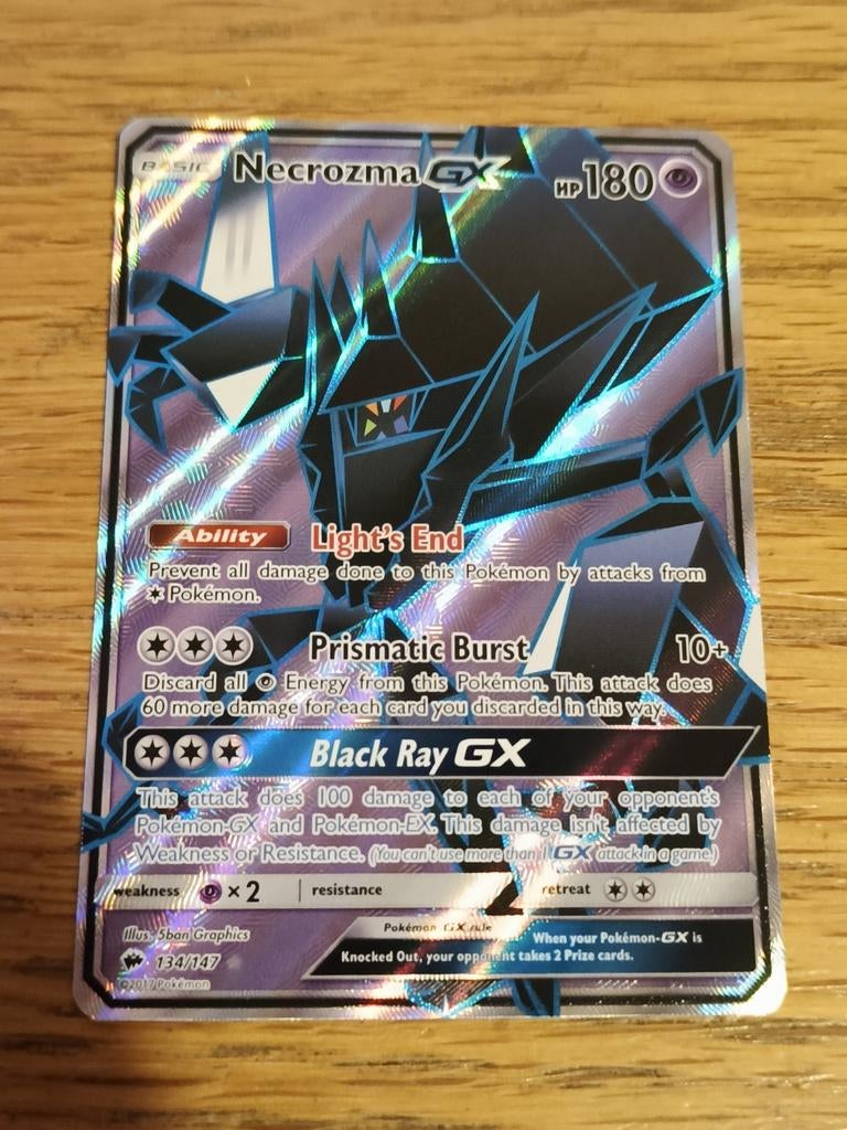 Necrozma GX 134/147 burning shadows, Ophalen of Verzenden, Zo goed als nieuw, Losse kaart, Foil