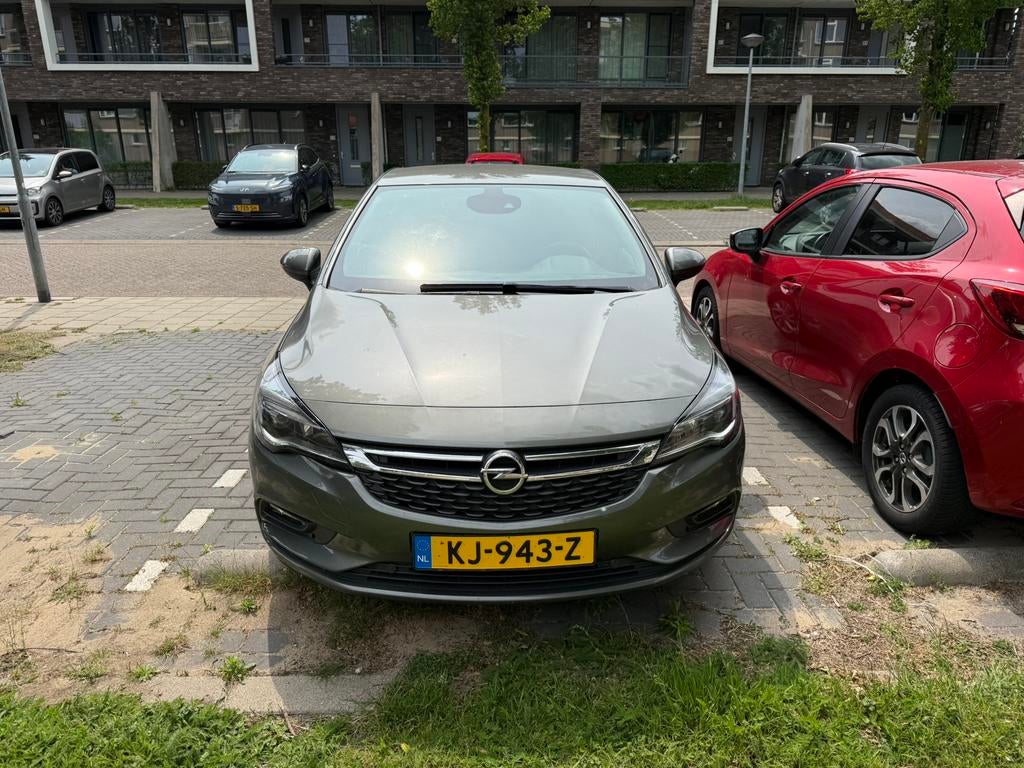 Opel Astra 1.4 Turbo 110KW 5D 2016 Grijs, Auto's, Opel, Euro 6, 4 cilinders, 150 pk, Origineel Nederlands