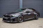 BMW M2 G87 | Carbon dak | Camera | Head up | HK | Sportstoel, Automaat, Achterwielaandrijving, Zwart, 2993 cc