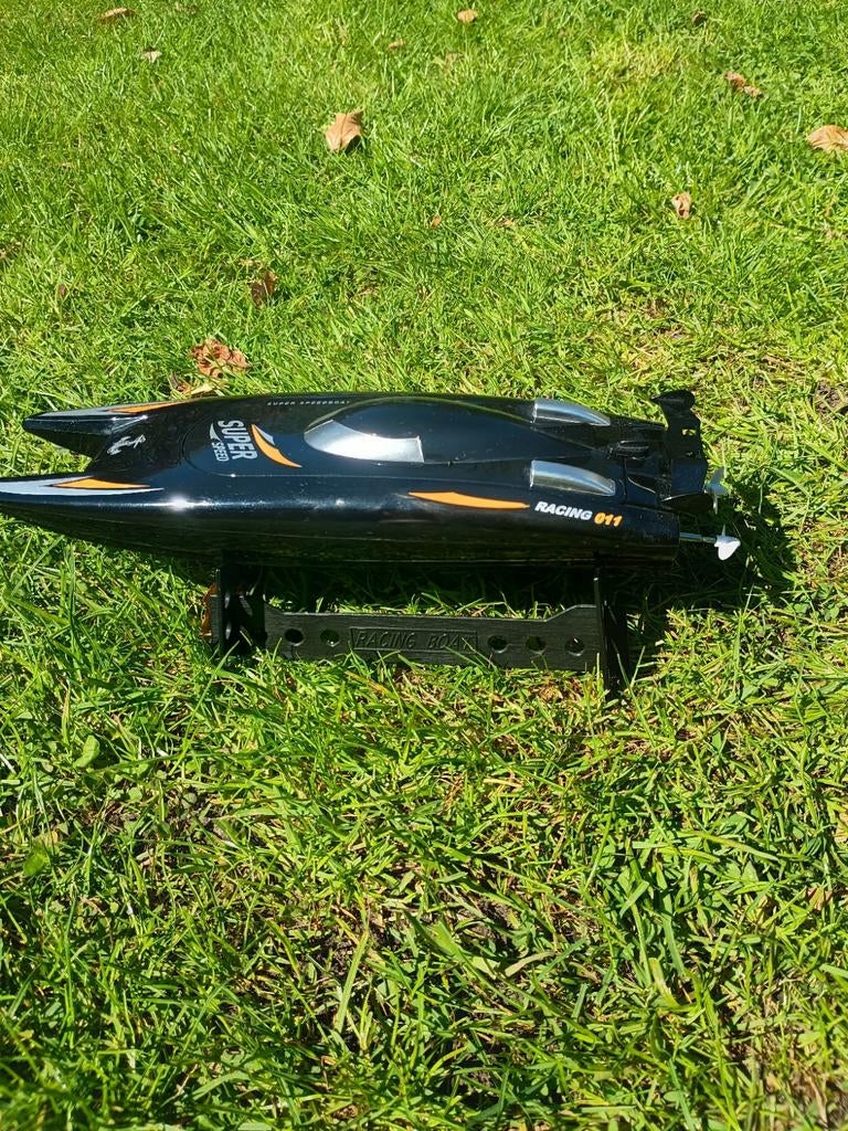 Speedboot superspeed zwart met oranje, Hobby en Vrije tijd, Modelbouw | Boten en Schepen, Ophalen