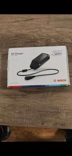 Bosch PowerTube 625 accu en 4A Smart Charger, Fietsen en Brommers, Ophalen of Verzenden, Zo goed als nieuw