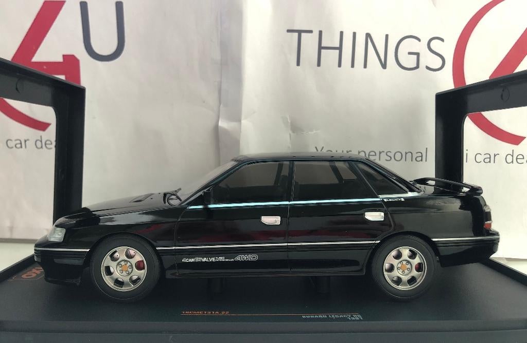 Ixo 1:18 Subaru Legacy RS 1991 zwart nieuw in verpakking, Hobby en Vrije tijd, Modelauto's | 1:18, Ophalen of Verzenden, Nieuw