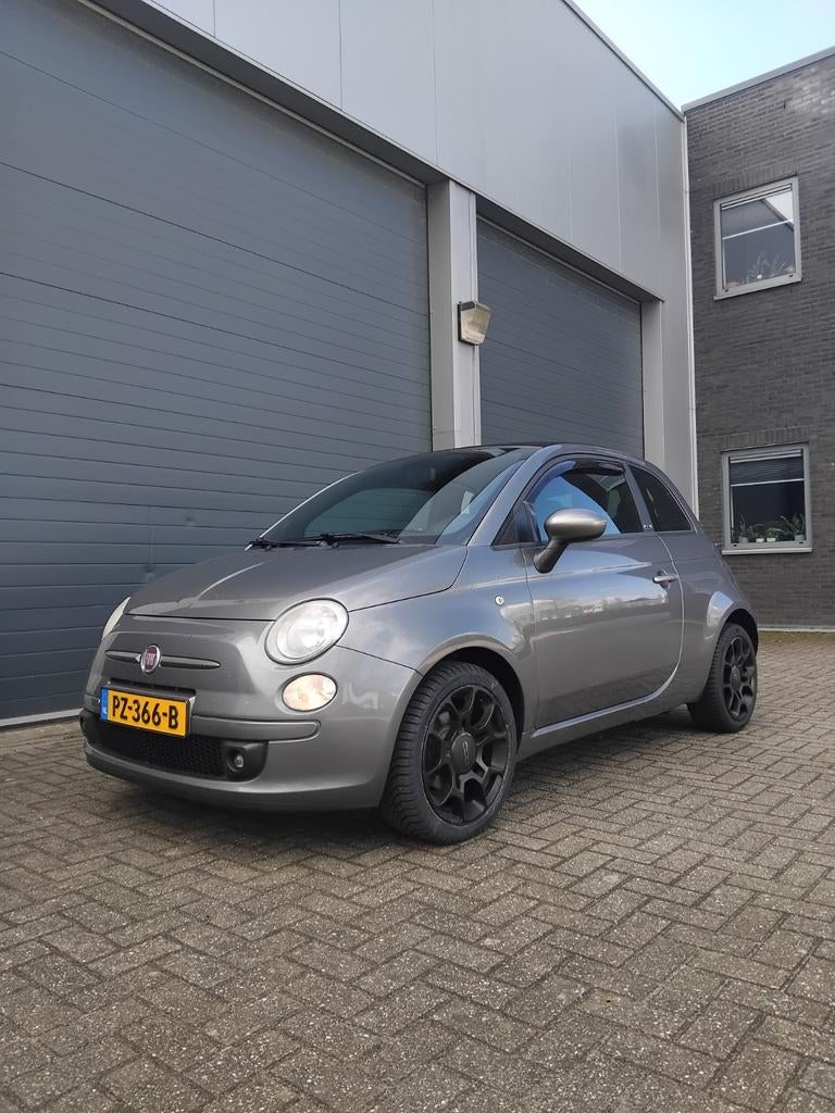 Fiat 500C 0.9 85pk Turbo Twinair 2012 Grijs, Auto's, 31 €/maand, Cabriolet, Leder en Stof, Handgeschakeld
