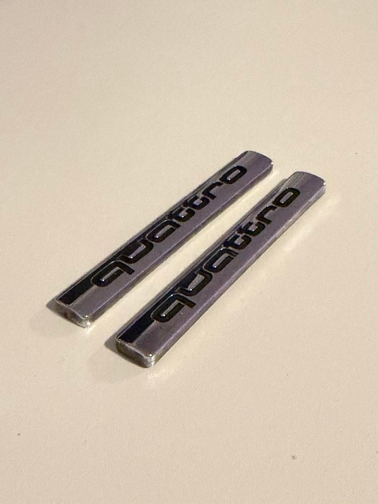 Audi Quattro + S origineel embleem, Ophalen