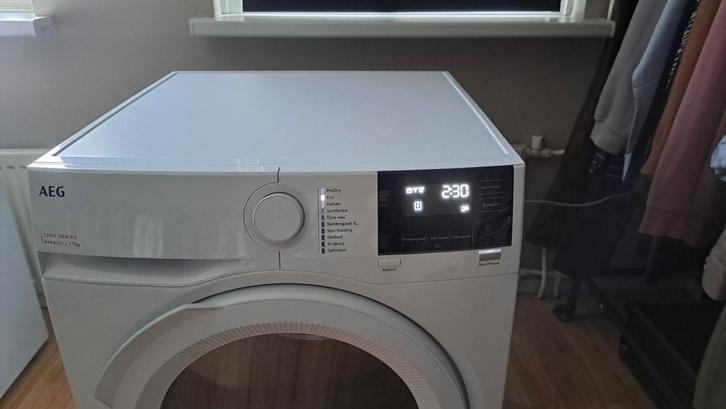 AEG wasdroger tr737l2b, Witgoed en Apparatuur, Wasmachines, Zo goed als nieuw, Voorlader, 6 tot 8 kg, 85 tot 90 cm, 1200 tot 1600 toeren