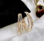 Goudkleurige oorbellen met strassteentjes., Sieraden, Tassen en Uiterlijk, Oorbellen, Ophalen of Verzenden, Nieuw, Goud, Overige materialen