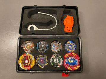 8 Beyblades Hasbro + Launcher & Opbergbox beschikbaar voor biedingen