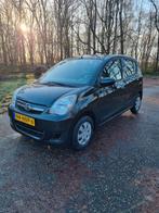 Daihatsu Cuore 1.0 5D 2009 Zwart, Auto's, Daihatsu, Voorwielaandrijving, Stof, 600 kg, Zwart