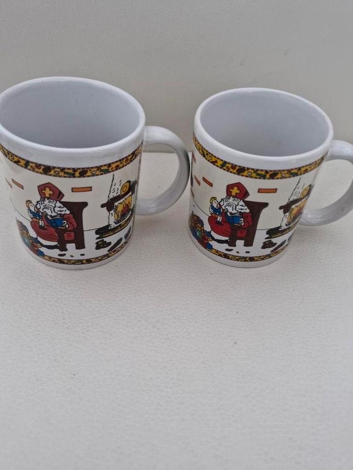 2 Sinterklaas Mokken, Huis en Inrichting, Keuken | Servies, Gebruikt, Kop(pen) en/of Schotel(s), Overige stijlen, Keramiek, Ophalen of Verzenden