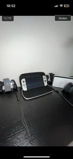 Nintendo Switch oled, Switch OLED, Met games, Met 2 controllers, Ophalen of Verzenden