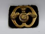 Oude slag baretembleem Aan- en Afvoertroepen oogjes direct, Verzenden, Landmacht, Nederland, Embleem of Badge