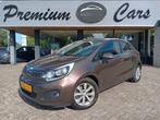 Kia Rio 1.4 CVVT 110PK Plus Pack|Automaat|Airco|Nav|Dealeron, Auto's, Kia, Euro 5, Gebruikt, Zwart, 4 cilinders