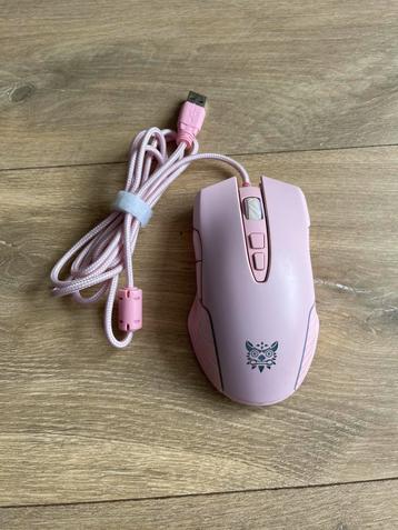 Roze muis met verlichting beschikbaar voor biedingen