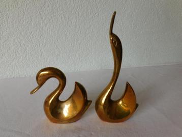 2 prachtige zwanen van koper, 1x hg 20,5 cm,1x hg 11 cm beschikbaar voor biedingen