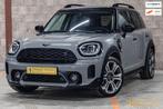 Mini Countryman 2.0 Cooper SE ALL4|Carplay|Cam|Dealer ond|1e, Auto's, Mini, Automaat, Stof, Zwart, Countryman