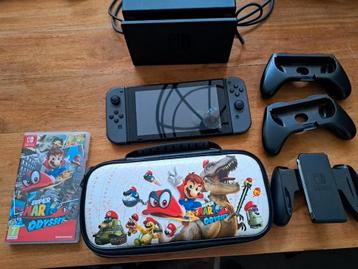 Nintendo Switch + Super Mario Odyssey + Accessoires beschikbaar voor biedingen