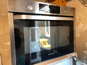 Mooie Samsung combi-magnetron oven  beschikbaar voor biedingen