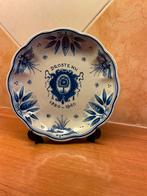 Droste bord, Ophalen