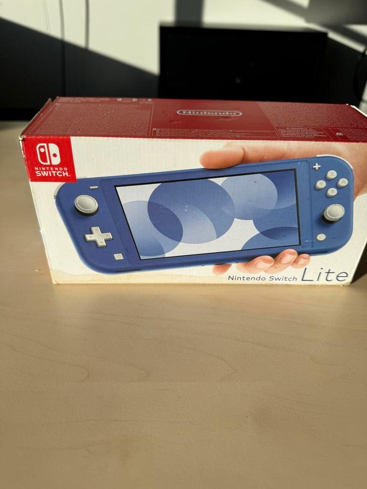 Nintendo Switch Lite Blauw - Nieuwstaat Compleet, Spelcomputers en Games, Spelcomputers | Nintendo Switch Lite, Zo goed als nieuw