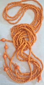 Lange oranje kralen ketting, Sieraden, Tassen en Uiterlijk, Kettingen, Ophalen of Verzenden, Gebruikt, Oranje, Kunststof