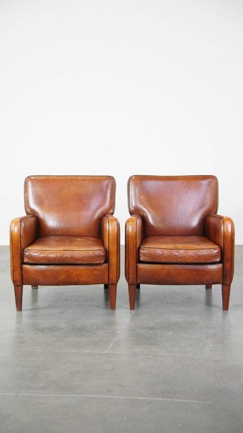 Set van 2 comfortabele armchairs gemaakt van schapenleer, Huis en Inrichting, Fauteuils, Gebruikt, Leer, 50 tot 75 cm, 75 tot 100 cm