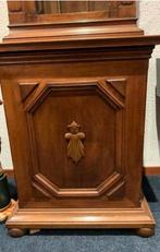 Staande klok met getorste pilaren, Ophalen