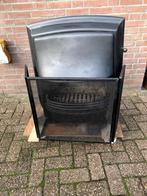 Houtkachel gietijzer voor onder een overkapping., Ophalen, Gebruikt, Houtkachel, Vrijstaand