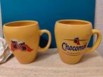 Twee prachtige Chocomel mokken, met verschillende opdruk., Verzenden, Zo goed als nieuw, Overige stijlen, Kop(pen) en/of Schotel(s)