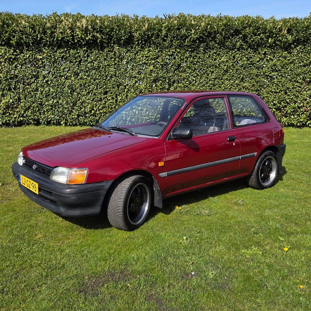 Toyota Starlet 1.3 XLI 12V E2 1995 Rood, Auto's, Toyota, USB, Stof, 4 cilinders, Starlet