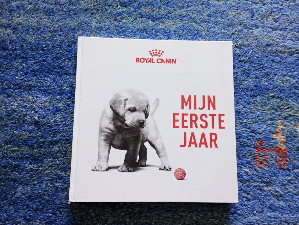 Royal Canin Mijn Eerste Jaar boek, Ophalen of Verzenden, Zo goed als nieuw, Honden